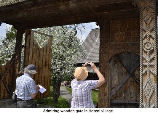 001-Admiring-wooden-gate-in-Hoteni-village